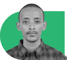 Portrait of a young man with short hair and a plaid shirt, against a bright green background.
